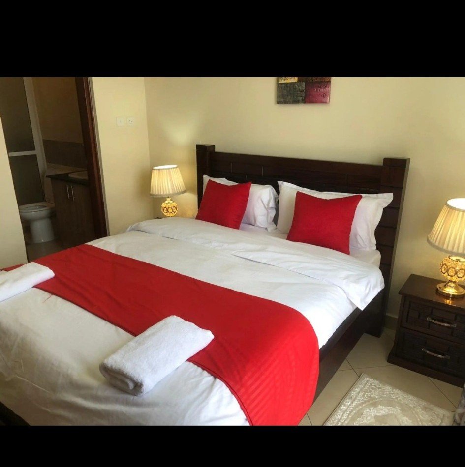 Slaapkamer van Westlands Place Apartments